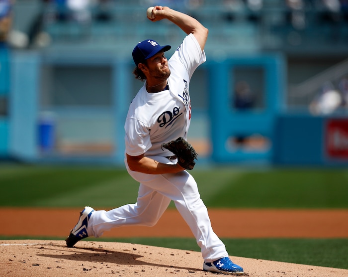 Los Angeles Dodgers starting pitcher Clayton Kershaw throws a pitch against the San Diego Padres during the first inning of a baseball game, Monday, April 3, 2017, in Los Angeles. (AP Photo/Ryan Kang)