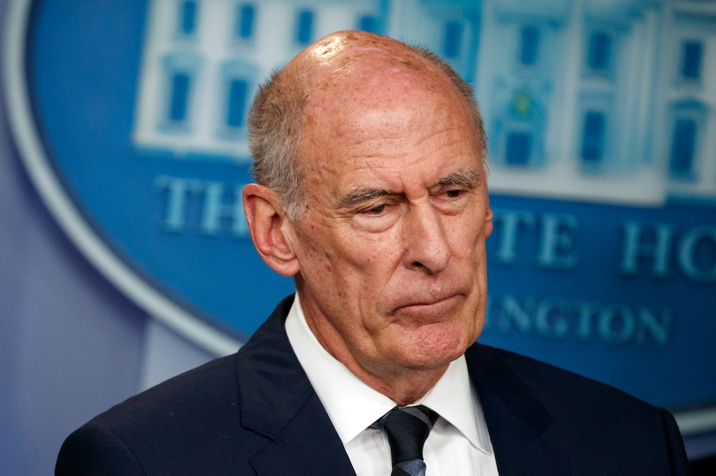 (Evan Vucci | AP file photo)  Director of National Intelligence Dan Coats listens during a daily press briefing at the White House in Washington on Aug. 2, 2018. Coats is to resign in days, after a two-year tenure marked by President Donald Trump's clashes with intelligence officials, U.S. officials said on Sunday, July 28, 2019.