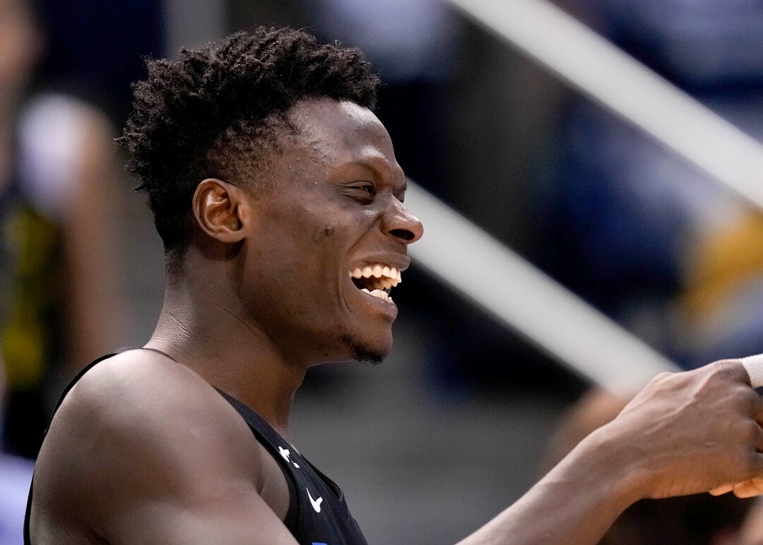 (Francisco Kjolseth | The Salt Lake Tribune) Brigham Young Cougars forward Gideon George (5) celebrates a win over the Westminster Griffins at the Marriott Center in Provo, Wednesday, Dec. 29, 2021.