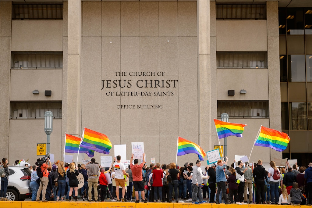 (Trent Nelson  |  The Salt Lake Tribune) Demonstrators at a rally about BYU's changing position on “romantic behavior” by same-sex couples gather in front of the headquarters of The Church of Jesus Christ of Latter-day Saints in 2020.