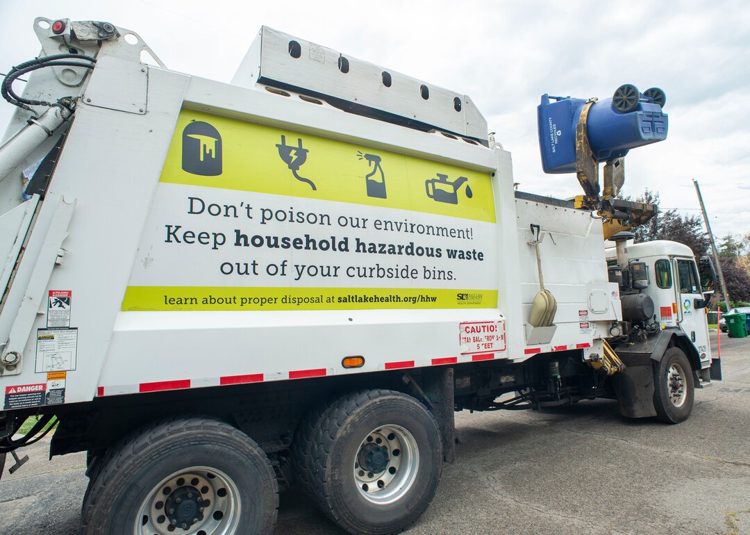 (Rick Egan  |  The Salt Lake Tribune) A recycle truck collects recycled material in Sugarhouse for the Wasatch Front Waste and Recycling District on Friday, July 26, 2019.