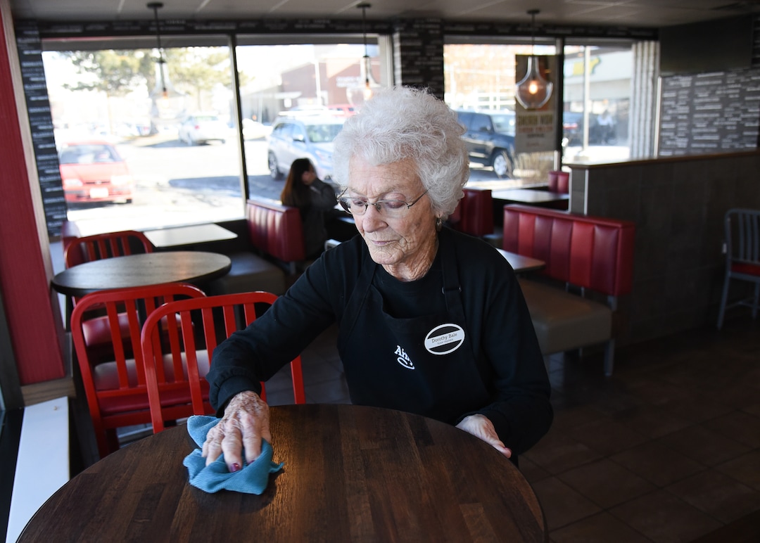 (Francisco Kjolseth  |  The Salt Lake Tribune)  Making the rounds to clean up table tops, after 25 years at Arby's, 94-year-old Dorothy Bale has no plans to retire from the job she started when she was 69.