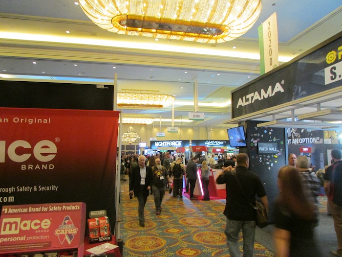 (Tom Wharton | Special to The Tribune) Crowds jam a hallway Jan. 23, 2018, filled with small booths at the 40th SHOT Show in Las Vegas.