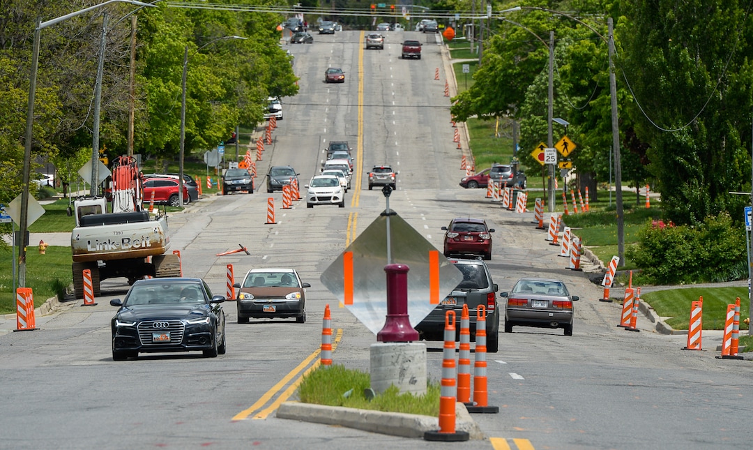 (Francisco Kjolseth  |  The Salt Lake Tribune)  Traffic moves along a sea of orange as plans to repurpose 29 parking spaces between 950 East and 1300 East on 900 South in Salt Lake City causes some frustration from business owners and residents in the area.