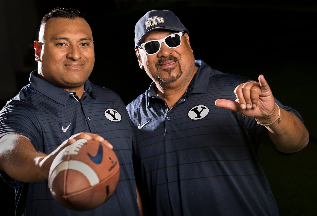 (Leah Hogsten  |  The Salt Lake Tribune) Brigham Young University head coach Kalani Sitake and his father Tom Sitake, Wednesday, August 2, 2017 during BYU's annual football photo day in the Indoor Practice Facility (IPF) on campus.