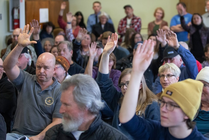 (Keith Johnson  |  for The Salt Lake Tribune) People raise their hands to asks questions during a town hall meeting held by newly elected Utah Congressman Ben McAdams, representing Utah's 4th District, at the Redwood Recreational Center in West Valley City, Utah on Jan. 19, 2019. McAdams held the town hall meeting to make good on a promise to be more accessible to constituents, a criticism he leveled against former congresswoman Mia Love during McAdam's campaign. 