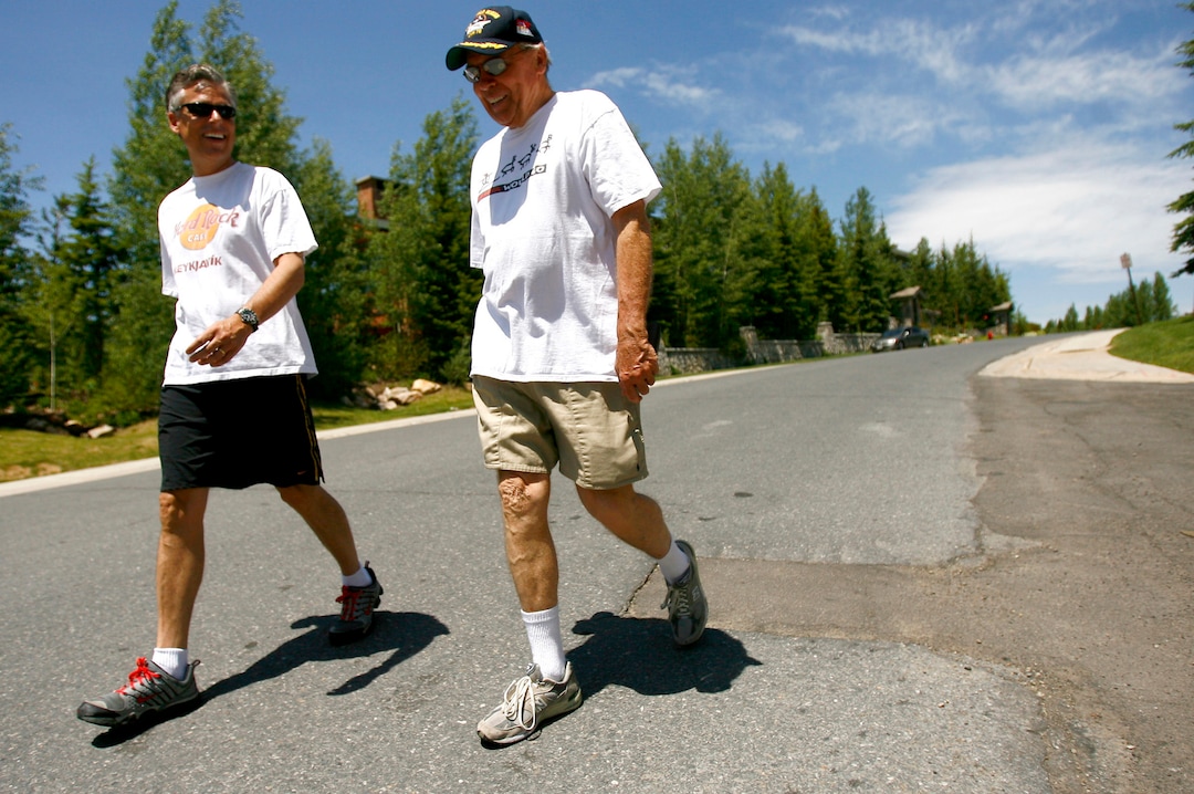 (Chris Detrick  |  Tribune file photo) Jon Huntsman Jr and Sr walk around Deer Valley Resort in June 2007.