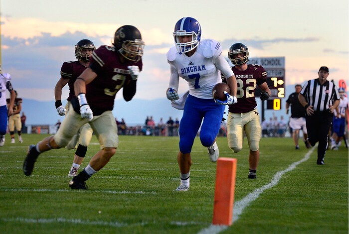 Scott Sommerdorf | The Salt Lake Tribune
Bingham WR Brayden Cosper gets the ball to the 4 yard line before Lone Peak's Ammon-Kaonohi Hannemann pushes him out of bounds. Bingham led Lone Peak 21-9 at the half, Friday, September 2, 2016.