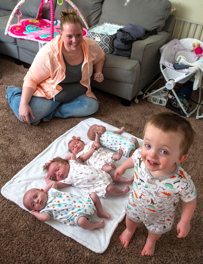 (Rick Egan  |  The Salt Lake Tribune)       Kayla Glines, with her quadruplets, Reese, Lincoln, Oaklee Jamesen at her home in Ogden, Saturday, June 15, 2019.