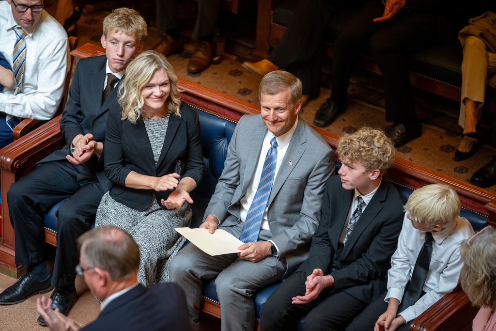 (Trent Nelson  |  The Salt Lake Tribune) Michael Menssen with his family in the Senate Chamber as he's confirmed to the Utah Supreme Court, at the Utah Capitol in Salt Lake City on Wednesday, Sept. 16, 2026.