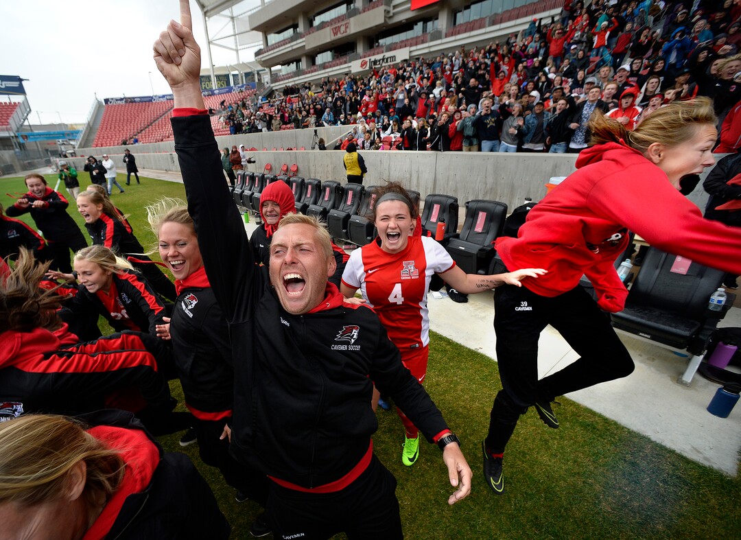 (Scott Sommerdorf   |  The Salt Lake Tribune)   American Fork Derek Dunn celebrates with his team as the Cavemen beat Syracuse 3-1 to win the 6A championship game played at Rio Tinto, Friday, October 20, 2017. 