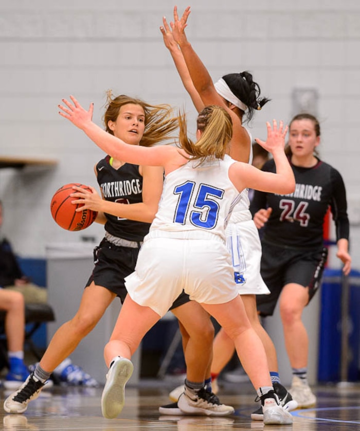 (Trent Nelson | The Salt Lake Tribune)  Northridge's Lauren Call (2) is double-teamed by Bingham's Maggie McCord (15) and Bingham's Journey Tupea (21) as Bingham faces Northridge in the 6A High School Girls' Basketball Tournament at SLCC in Taylorsville, Thursday Feb. 22, 2018.