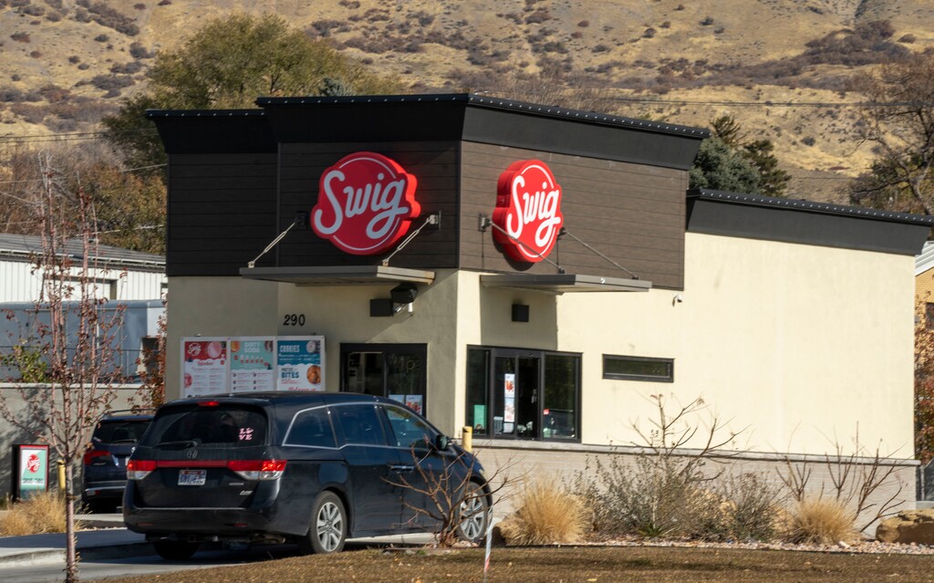 (Rick Egan | The Salt Lake Tribune) Cars line up for soda at the Swig on State Street in Lindon, on Tuesday, Nov 19, 2024.