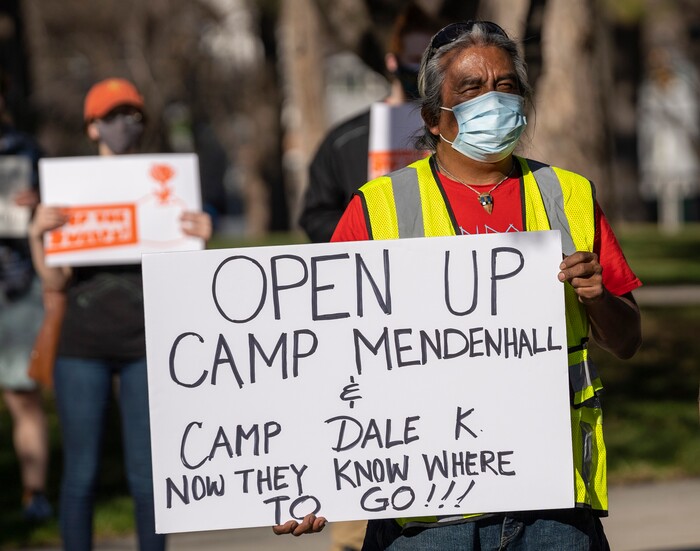 (Rick Egan | The Salt Lake Tribune) Dave John listens to speakers, during a rally demanding an end to the policy of violence and terror inflicted on our unsheltered community at the hands of the Salt Lake County Health Department, Salt Lake City, and Salt Lake City Police Department, at Washington Square, on Friday, April 2, 2021.