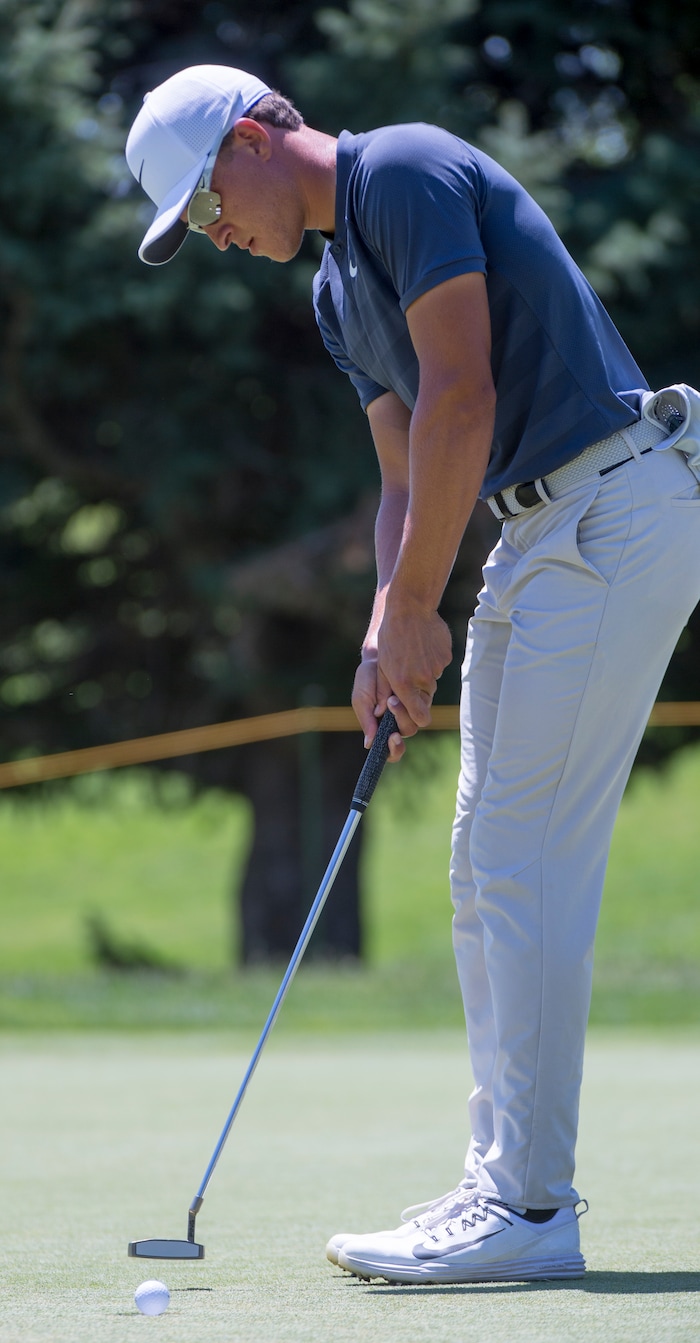 (Rick Egan  |  The Salt Lake Tribune)     Cameron Champ from Sacrament, CA, putts the ball, during the second round of the Utah Championship golf event on the Web.com Tour at Oakridge Country Club in Farmington. Champ finished 17-under par to lead the field for the second day in a row. July 13, 2018.


