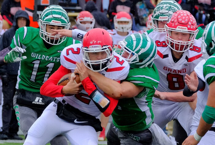 (Leah Hogsten  |  The Salt Lake Tribune)   Grand County's Andrew Hansen runs for a first down.  South Summit High School boys' football team defeated Grand County High School 47-9 during their class 2A state semifinal football game Saturday, November 4, 2017 at Weber State University's Stewart Stadium.