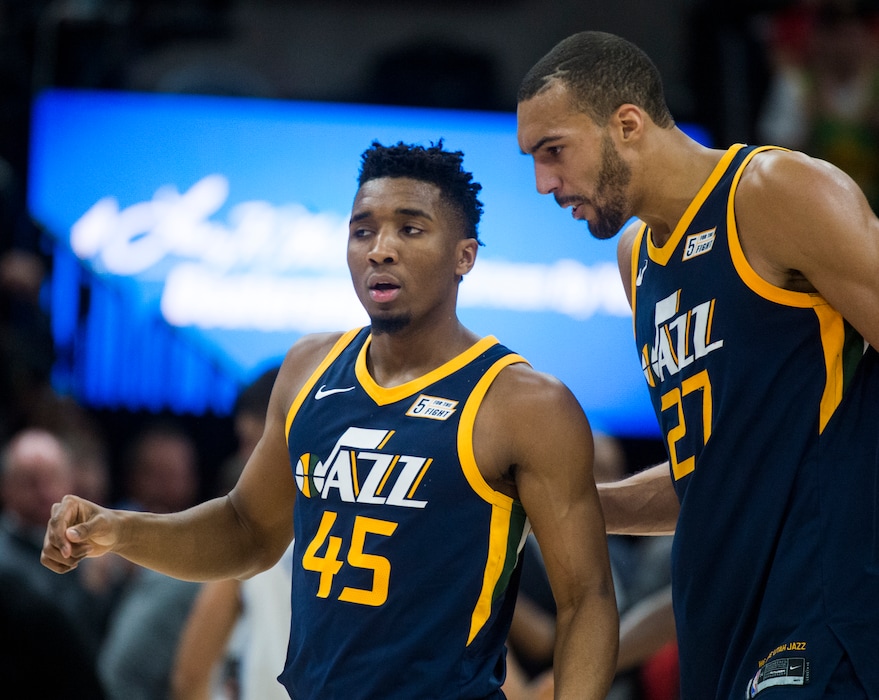(Rick Egan  |  The Salt Lake Tribune)    Utah Jazz guard Donovan Mitchell chats with Utah Jazz center Rudy Gobert, during a break in the action, in NBA action between the Utah Jazz and the Orlando Magic,  Monday, March 5, 2018.