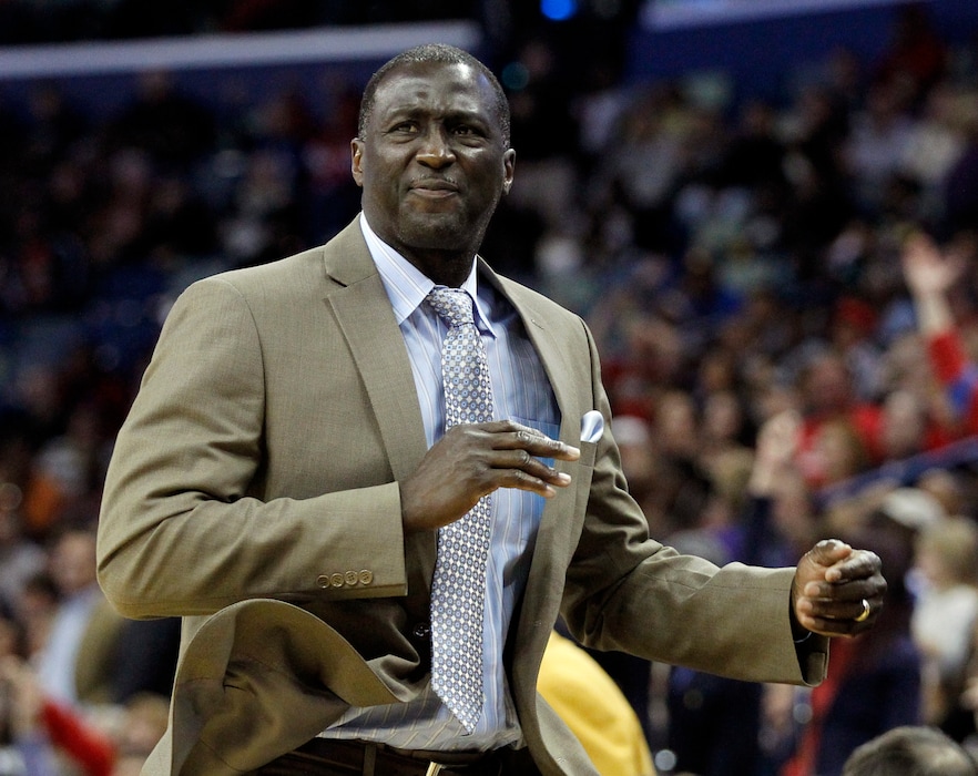 Sacramento Kings Tyrone Corbin reacts to a shot in the first half of an NBA basketball game against New Orleans Pelicans in New Orleans, Tuesday, Nov. 25, 2014. Corbin took over as coach after Sacramento Kings head coach Michael Malone was ejected for a second technical foul. (AP Photo/Butch Dill)