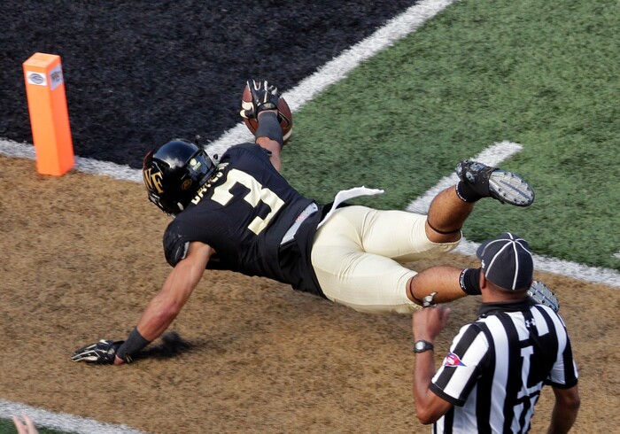 Wake Forest's Jessie Bates III (3) dives in vain for the end zone after returning a punt against Utah State in the second half of an NCAA college football game in Winston-Salem, N.C., Saturday, Sept. 16, 2017. Bates was called down at the 3-yard line. (AP Photo/Chuck Burton)