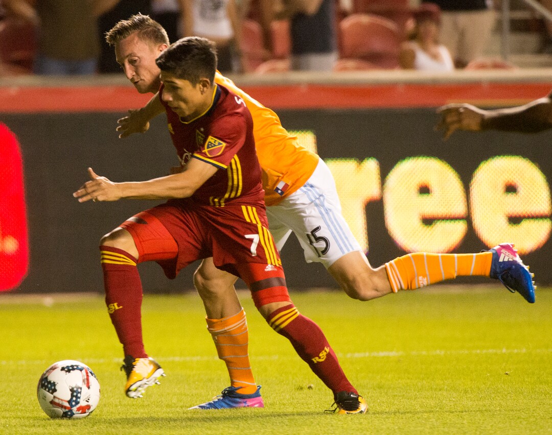 (Rick Egan  |  The Salt Lake Tribune)  Real Salt Lake midfielder Luis Silva (20) goes of the ball along with Houston Dynamo midfielder Eric Alexander (6), in MLS action, Real Salt Lake Vs. Houston Dynamo, in Sandy, Saturday, August 5, 2017.