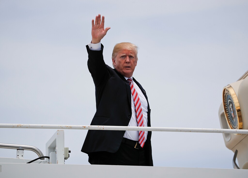 (AP Photo/Pablo Martinez Monsivais) President Donald Trump waves as he boards Air Force One before his departure from Naval Air Station Key West in Key West, Fla., Thursday, April 19, 2018. Trump was visiting Joint Interagency Task Force South anti-smuggling center in Key West Fla., and flying back to nearby Palm Beach, Fla., to spend the weekend at this private Mar-a-Lago club.
