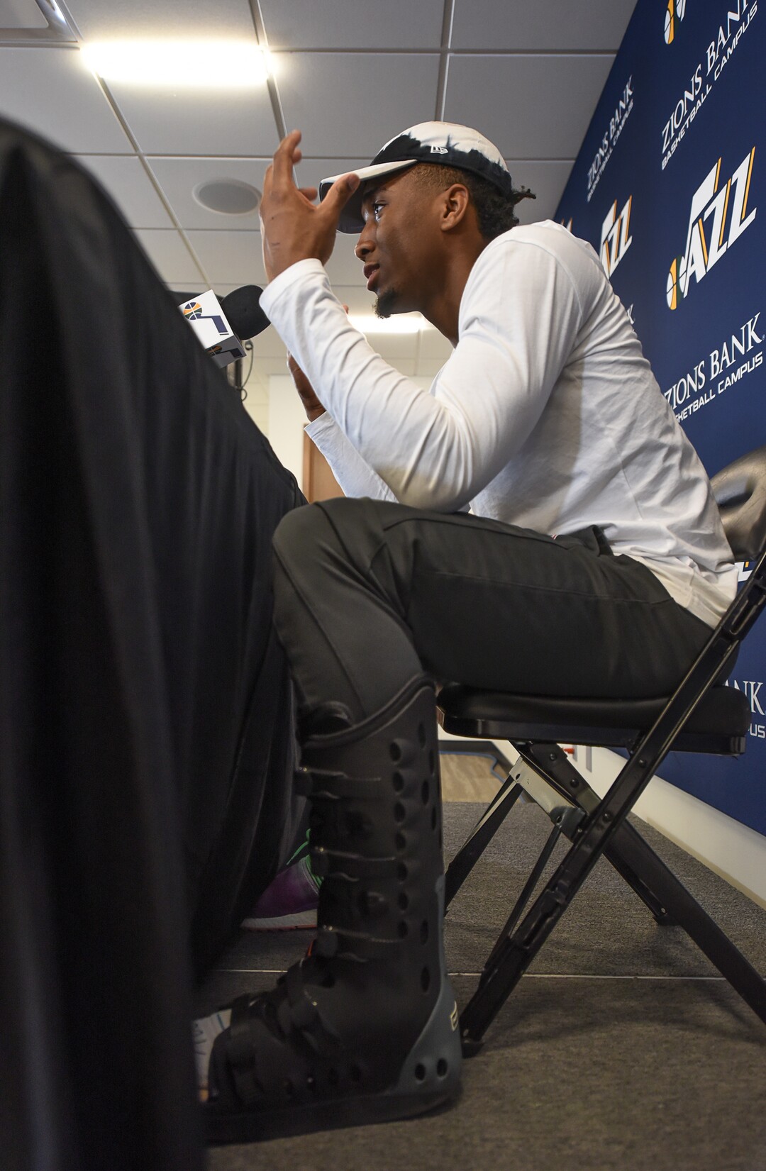 (Francisco Kjolseth  |  The Salt Lake Tribune)  Utah Jazz      guard Donovan Mitchell says his foot is feeling better but wears a boot as a precaution as he speaks with the media during exit interviews at their practice facility in Salt Lake City Wed., May 8, 2018, after losing to the Houston Rockets in game 5 of their Western Conference Semifinals during the 2018 NBA Playoffs.