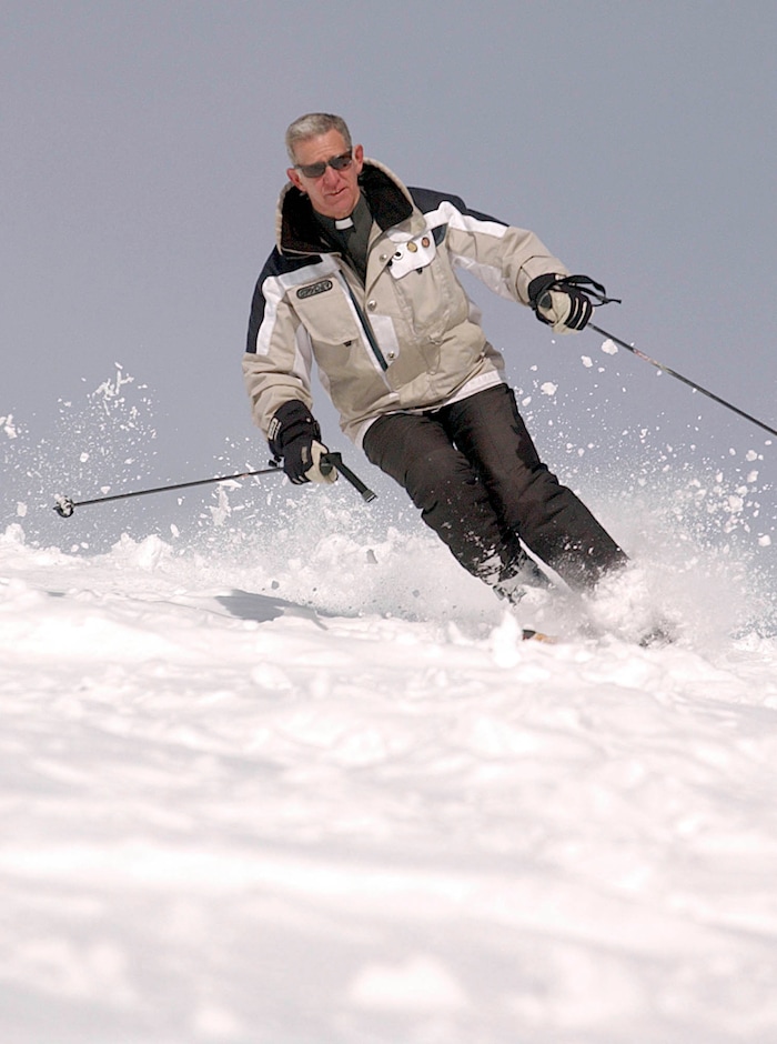 Francisco Kjolseth  |  The Salt Lake Tribune

Reverend Bob Bussen otherwise known as father Bob from St. Mary's Catholic Church takes to the slopes of Park City Mountain Resort in telemarking gear, " I do allot of ministry on the mountain in funny ways" he said, and claims credit for the last few snow storms especially the ones on Sunday.   