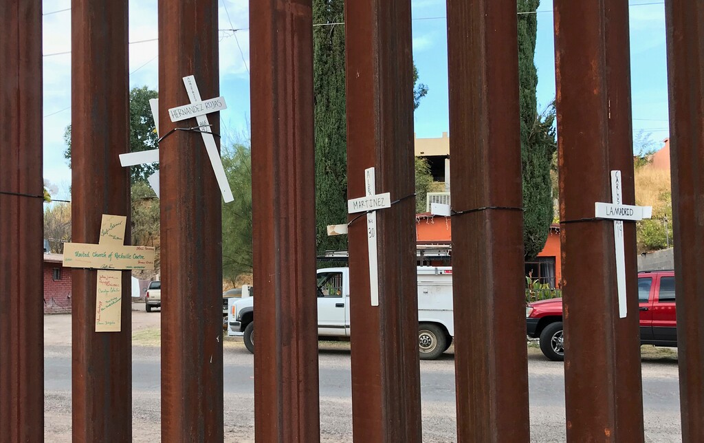 (Anita Snow | The Associated Press) In this photo taken Monday, Dec. 4, 2017, in Nogales Mexico, crosses with the names of migrants who have died on the northbound journey to the United States. The federal government on Tuesday, Dec. 5, 2017, issued its most complete statistical snapshot of immigration enforcement under President Donald Trump, saying Border Patrol arrests plunged to a 45-year low while arrests by deportation officers soared.