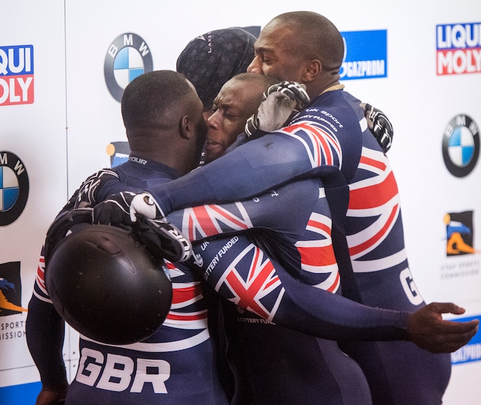 (Rick Egan  |  The Salt Lake Tribune)   The Great Brittain team of Lamin Deen, Ben Simons, Toby Olubi and Andrew Mathews celebrate their lead after their second run in the BMW IBSF World Cup 4-Man Bobsleigh competition. November 18, 2017.