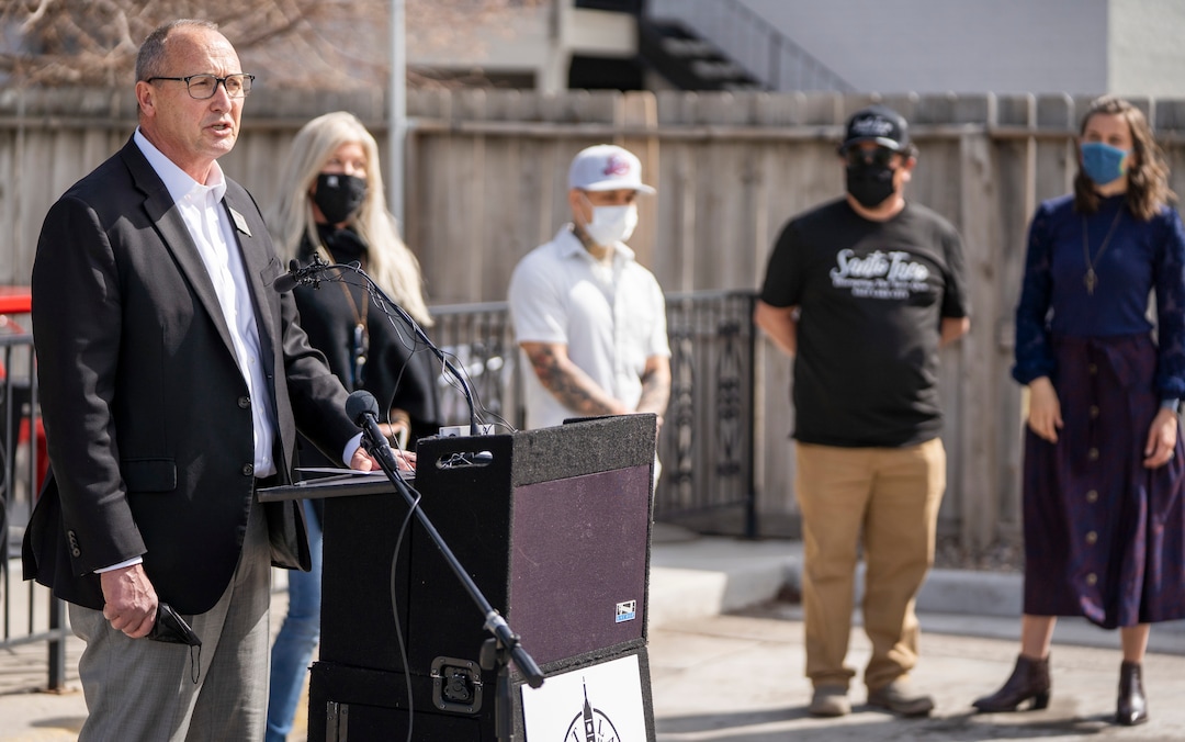 (Rick Egan | The Salt Lake Tribune) Mark Jenson, of Harmon's Grocery, speaks at a news conference along with Salt Lake City Mayor Erin Mendenhall, encouraging citizens to keep wearing masks, after the state mask mandate ends, Friday, March 19, 2021.