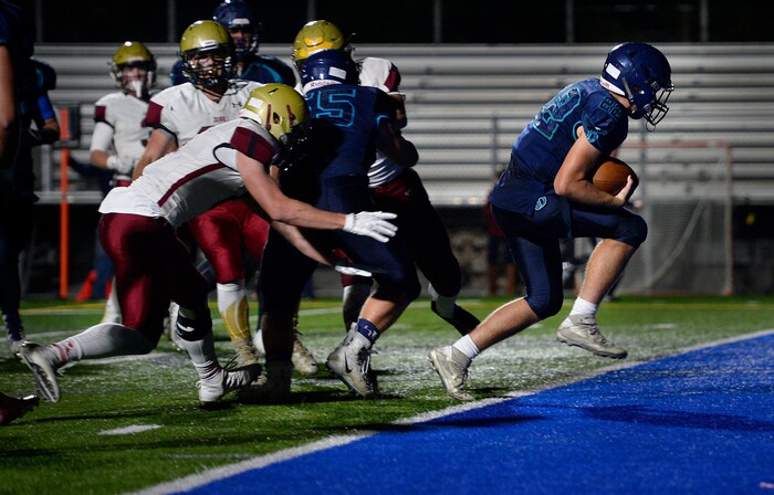(Scott Sommerdorf   |  The Salt Lake Tribune)   Juan Diego RB Tristen Tonozzi scoots across the goal line for a TD during first half play making the score 21-6. Juan Diego beat Juab 33-28, Friday, October 6, 2017. 