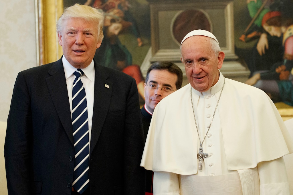 (Evan Vucci | AP | Pool) U.S. President Donald Trump stands with Pope Francis in 2017. Questions arise about their relationship in a second Trump administration.
