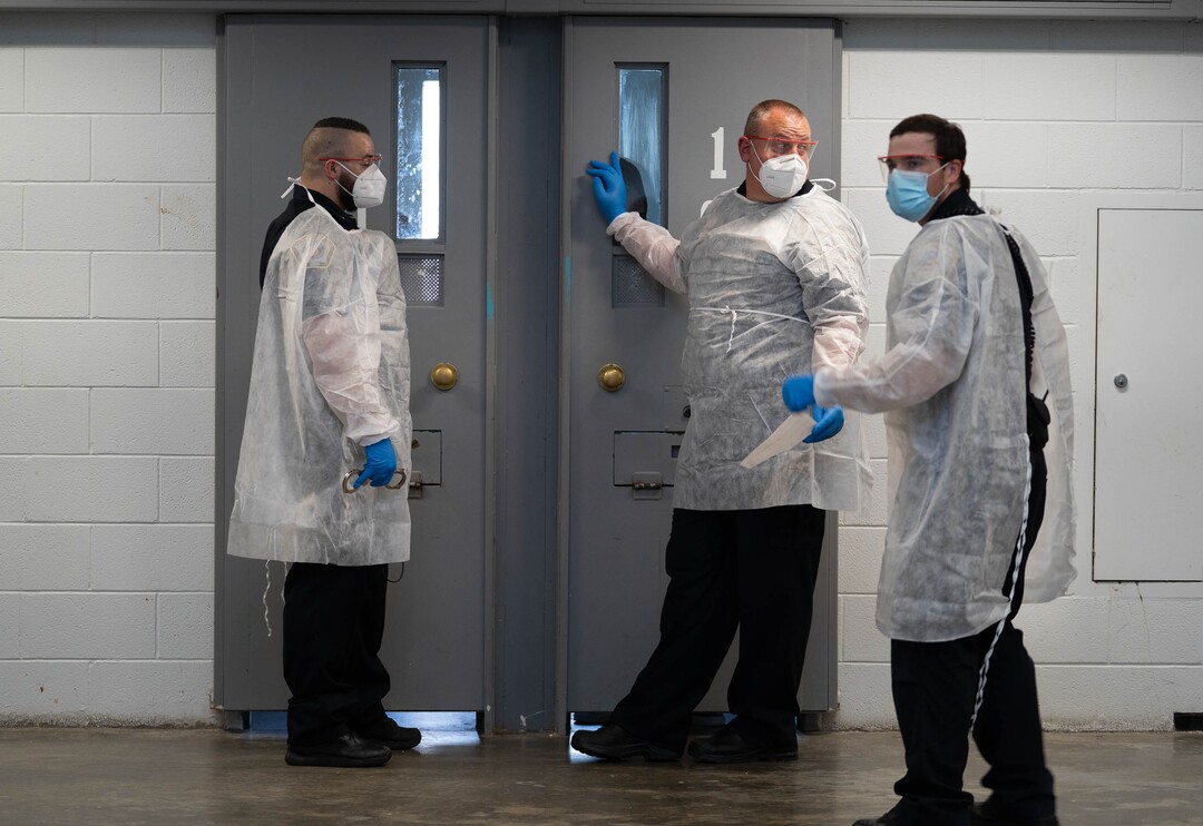 (Francisco Kjolseth | The Salt Lake Tribune) Prison staff work to safely move inmates from their cells into the common day room to be vaccinated against COVID-19 during a vaccination event with interested incoming inmates at the Utah State Prison in Draper on Tuesday, July 27, 2021.