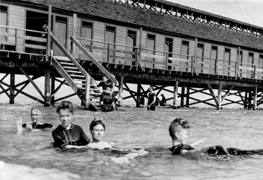 (Utah State Historical Society) Great Salt Lake bathers at Saltair I. Each side of the Saltair I pavilion sported long, curved walkways with rows of bathhouses or changing rooms on each side.