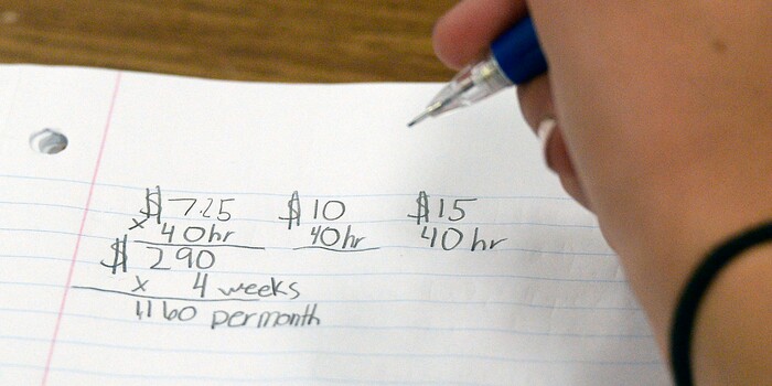 (Al Hartmann | The Salt Lake Tribune) A seventh grader does the math of making a living while discussing careers and finding part-time work in a class at Park Valley School Wednesday August 30.