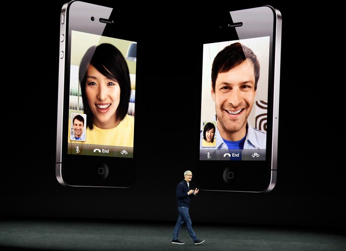 Apple CEO Tim Cook discusses the new iPhone 8 at the Steve Jobs Theater on the new Apple campus, Tuesday, Sept. 12, 2017, in Cupertino, Calif. (AP Photo/Marcio Jose Sanchez)