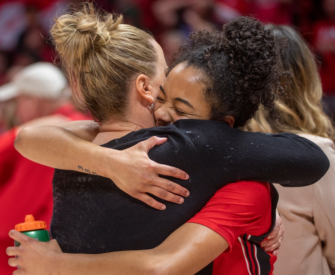 (Rick Egan | The Salt Lake Tribune) Utah Utes guard Lani White (3) hugs Head Coach Lynne Roberts, as they celebrate the Utes 84-78 win over the Stanford Cardinals, in PAC-12 action, at the Jon M. Huntsman Center, on Saturday, Feb. 25, 2023.