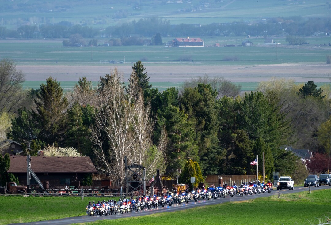 (Rick Egan | The Salt Lake Tribune)  The funeral procession makes its way up 100 West to the Newton Cemetery, for the interment of Orrin Hatch, on Friday, May 6, 2022.