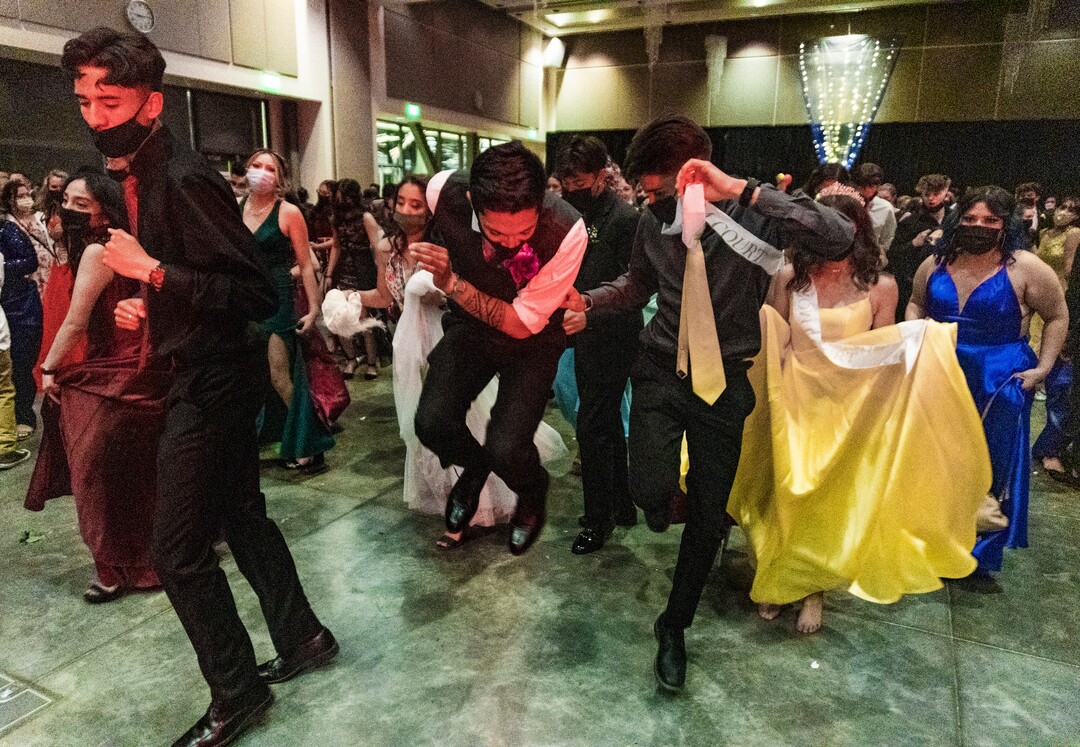 (Rick Egan | The Salt Lake Tribune)Students get crazy during a line dance, during the Cyprus High school Prom, at the Viridian Event Center, on Saturday, April 24, 2021.