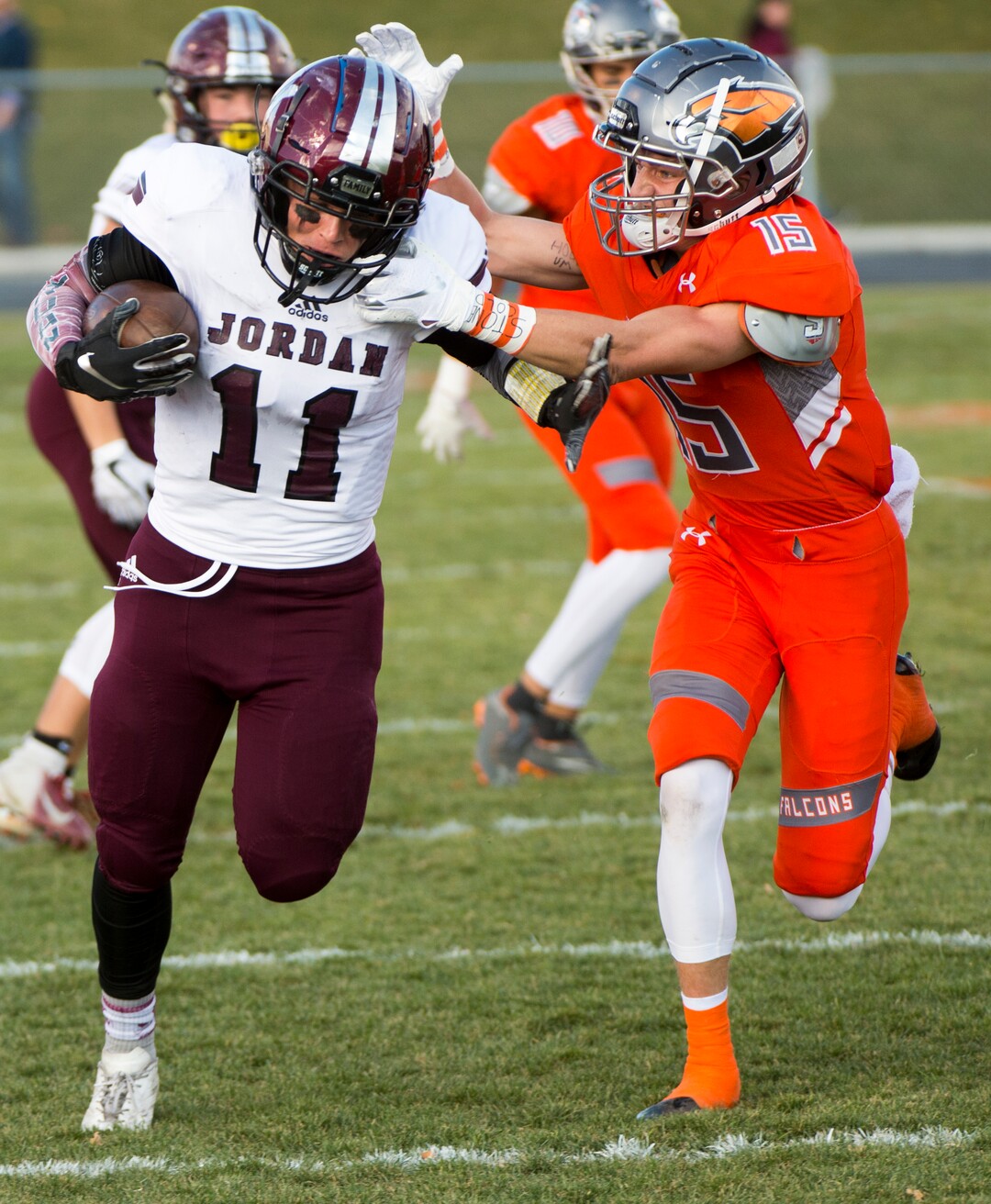 (Rick Egan  |  The Salt Lake Tribune)   Ty Arrington, Skyridge, brings down Jordan running back Jake Shaver (11) as he runs for a huge gain, in prep 5A playoff action between Jordan High and Skyridge High, in Lehi, Friday, Nov. 2, 2018.