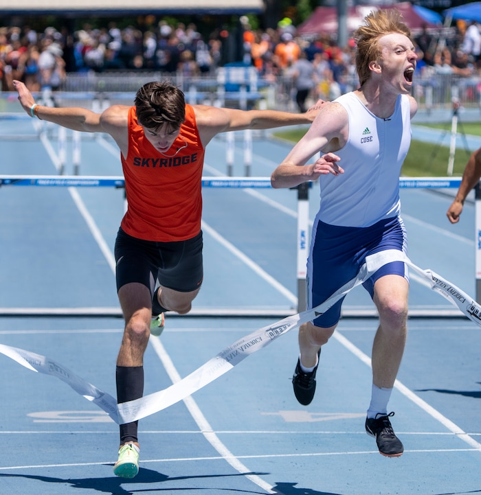 (Rick Egan | The Salt Lake Tribune)     Jaren Arnold Syracuse, celebrates as he crosses the fishline ahead of Jacob Smart, of Sky Ridge, in the 6A Boys 300 meter Hurdles, at the State High School Championships at BYU, on Saturday, May 21, 2022.
