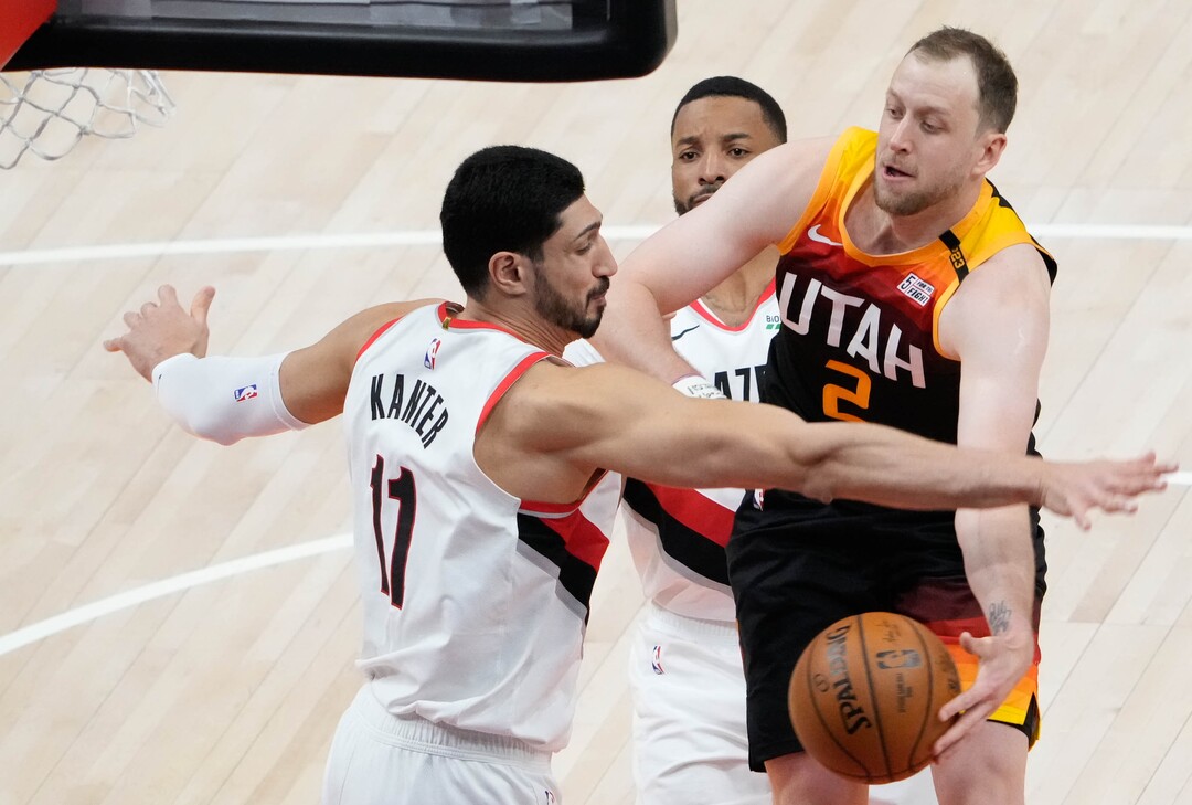 (Francisco Kjolseth | The Salt Lake Tribune) Utah Jazz guard Joe Ingles (2) passes the ball past Portland Trail Blazers center Enes Kanter (11) in NBA action between the Utah Jazz and the Portland Trail Blazers, at Vivint Smart Home Arena, on Wednesday, May 12, 2021.