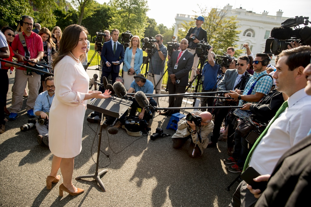 White House press secretary Sarah Huckabee Sanders speaks to reporters on the North Lawn outside the West Wing at the White House in Washington, Thursday, May 23, 2019.(AP Photo/Andrew Harnik)