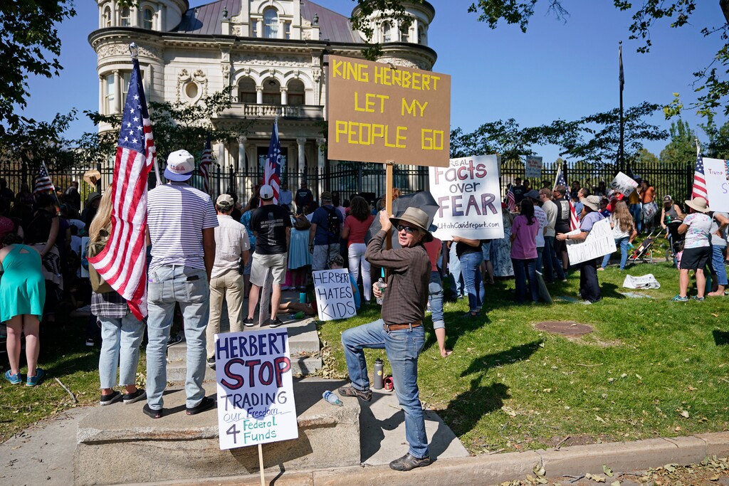 (Rick Bowmer | AP file photo)

In this Sept. 12, 2020, photo, people protest Gov. Gary Herbert during an anti-mask rally outside of the Governors Mansion in Salt Lake City.