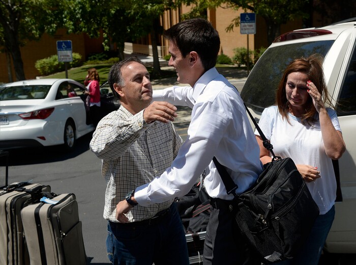 Al Hartmann  |  The Salt Lake TribuneMissionaries have just enough time to unload their luggage and hug their family members goodbye at the Missionary Training Center in Provo Wednesday July 26. 