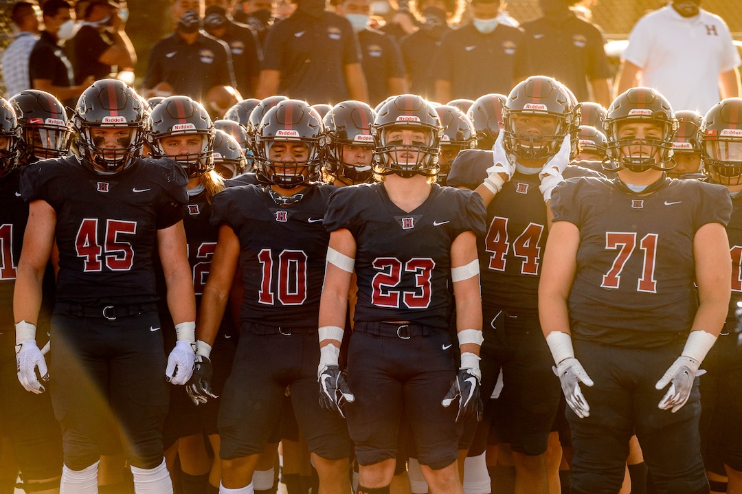 (Trent Nelson  |  The Salt Lake Tribune) Herriman players prepare to face Davis in a high school football game in Herriman on Thursday, Aug. 13, 2020.