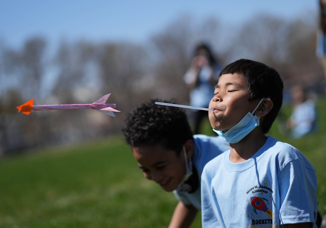 (Francisco Kjolseth  | The Salt Lake Tribune) Mary W. Jackson Elementary first grader Isaiah Kam, 7, launches his straw rocket as students commemorate their school’s namesake’s 100th birthday on Friday, April 9, 2021, with a special science lesson in the mechanics of rocket building. Salt Lake City’s oldest elementary school was renamed in 2018 in honor of the the first African American female engineer at NASA, with students recently voting to change their mascot to “The Rockets.”