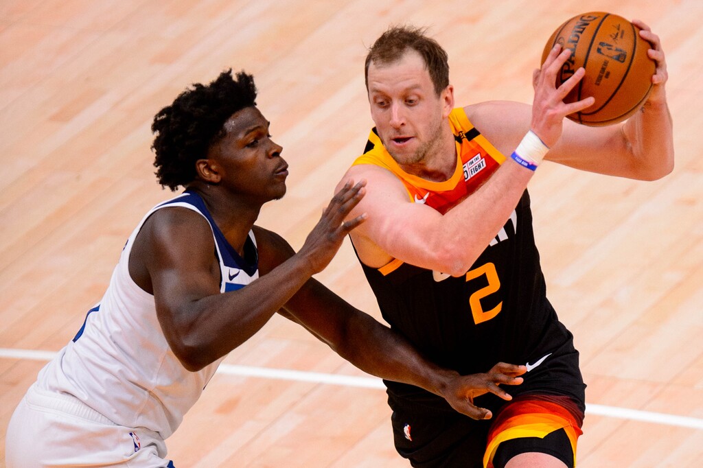 (Trent Nelson  |  The Salt Lake Tribune) Utah Jazz forward Joe Ingles (2) drives past Minnesota Timberwolves guard Anthony Edwards (1) as the Utah Jazz host the Minnesota Timberwolves, NBA basketball in Salt Lake City on Saturday, Dec. 26, 2020.