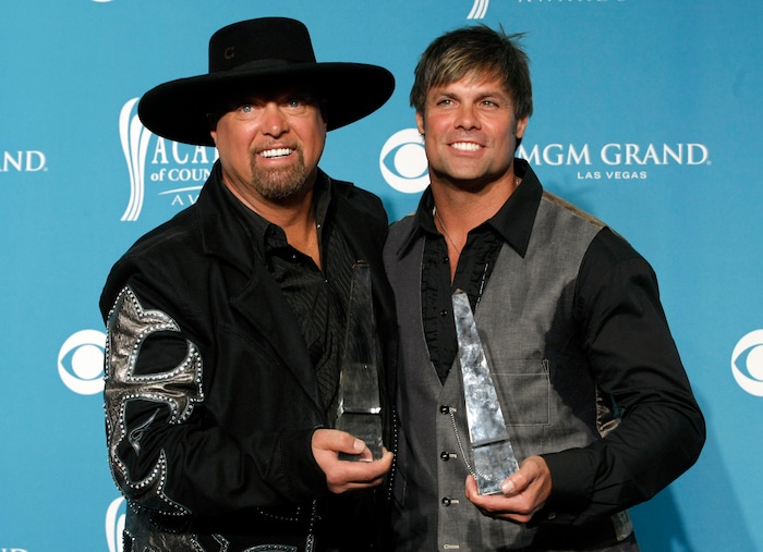 Eddie Montgomery, left, and Troy Gentry pose with their Home Depot Humanitarian Award backstage at the 45th Annual Academy of Country Music Awards in Las Vegas on Sunday, April 18, 2010. (AP Photo/Dan Steinberg)
