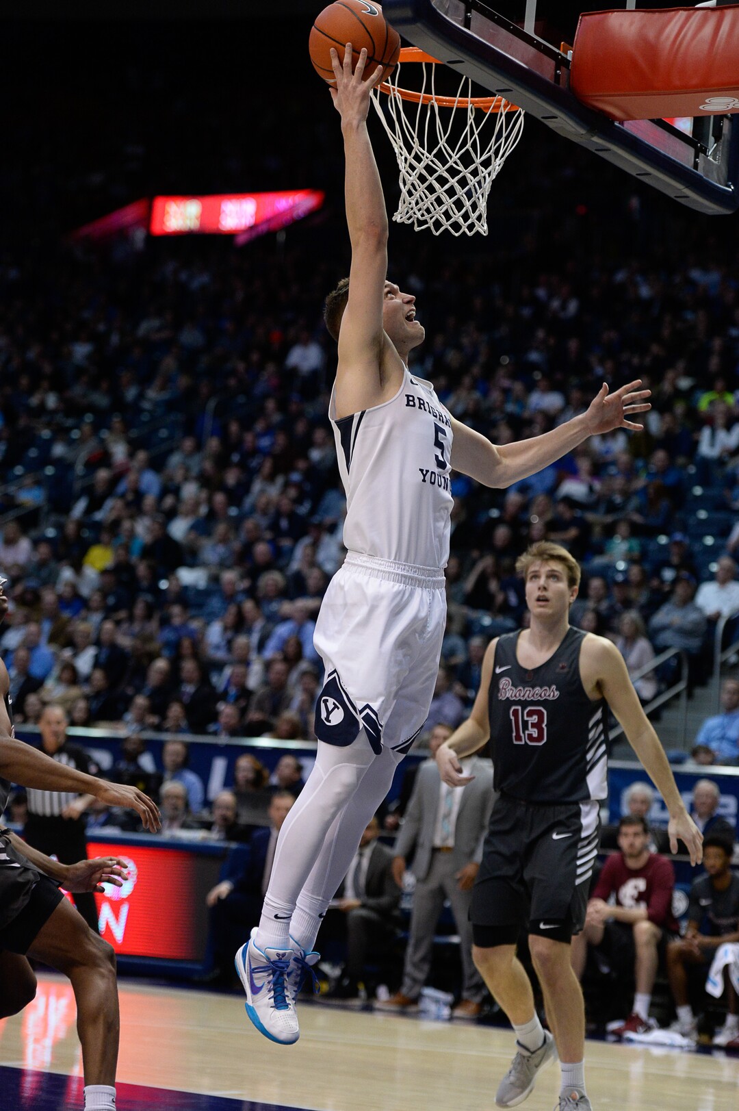 (Francisco Kjolseth  |  The Salt Lake Tribune) Brigham Young Cougars guard Jake Toolson (5) sails in the the basket in the first half as the Brigham Young Cougars host the Santa Clara Broncos at the Marriott Center in Provo, Thursday, Feb. 20, 2020.